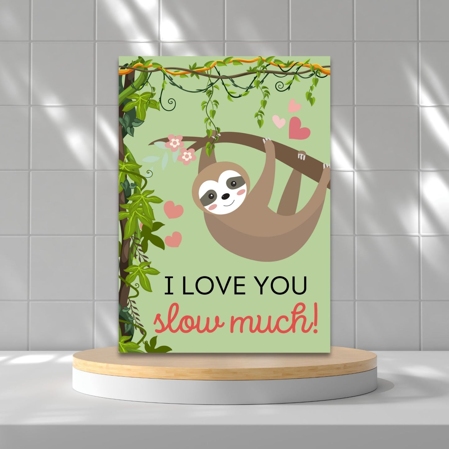 Printable Valentineās Day Greeting Card featuring the pun āI Love You Slow Much.ā Designed as a 5x7 PDF on an 8.5 x 11 sheet with two cards per page. A cute and funny Valentineās card for nature and sloth lovers.
