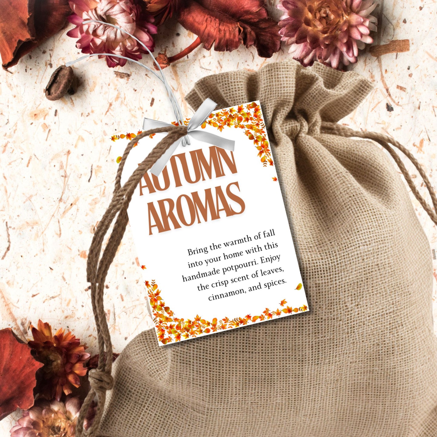 Printable 'Autumn Aromas' fall gift tags with a festive leaf border, perfect for seasonal gifting, potpourri, and Thanksgiving presents. Includes customizable To/From sections for a personalized touch.