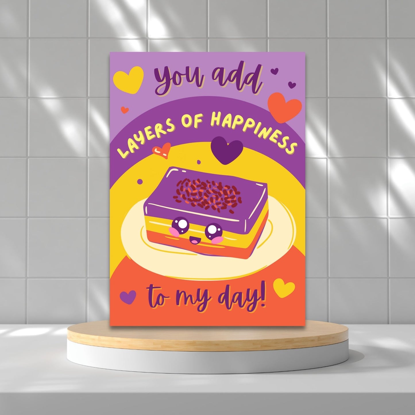 Printable Valentineās Day card featuring the phrase āYou Add Layers of Happiness to My Dayā with a Filipino Sapin-Sapin-inspired design. Designed as a 5x7 PDF on an 8.5 x 11 sheet with two cards per page. A punny and heartfelt Valentineās card for Filipino food lovers.