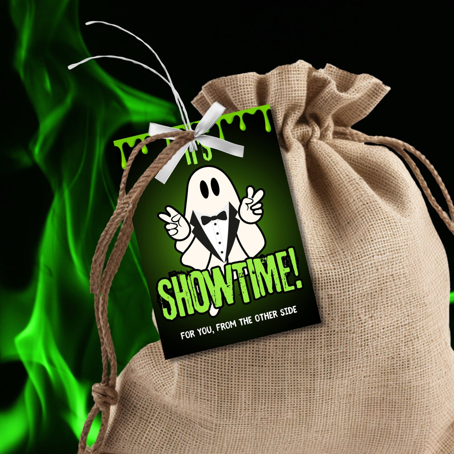 Halloween gift tag design inspired by Beetlejuice with the phrase "It's Showtime!" featuring a ghost in a tuxedo on a green dripping goo background. Sized at 2.5 x 3.5 inches, these tags are laid out 8 per sheet, perfect for dressing up Halloween treats.
