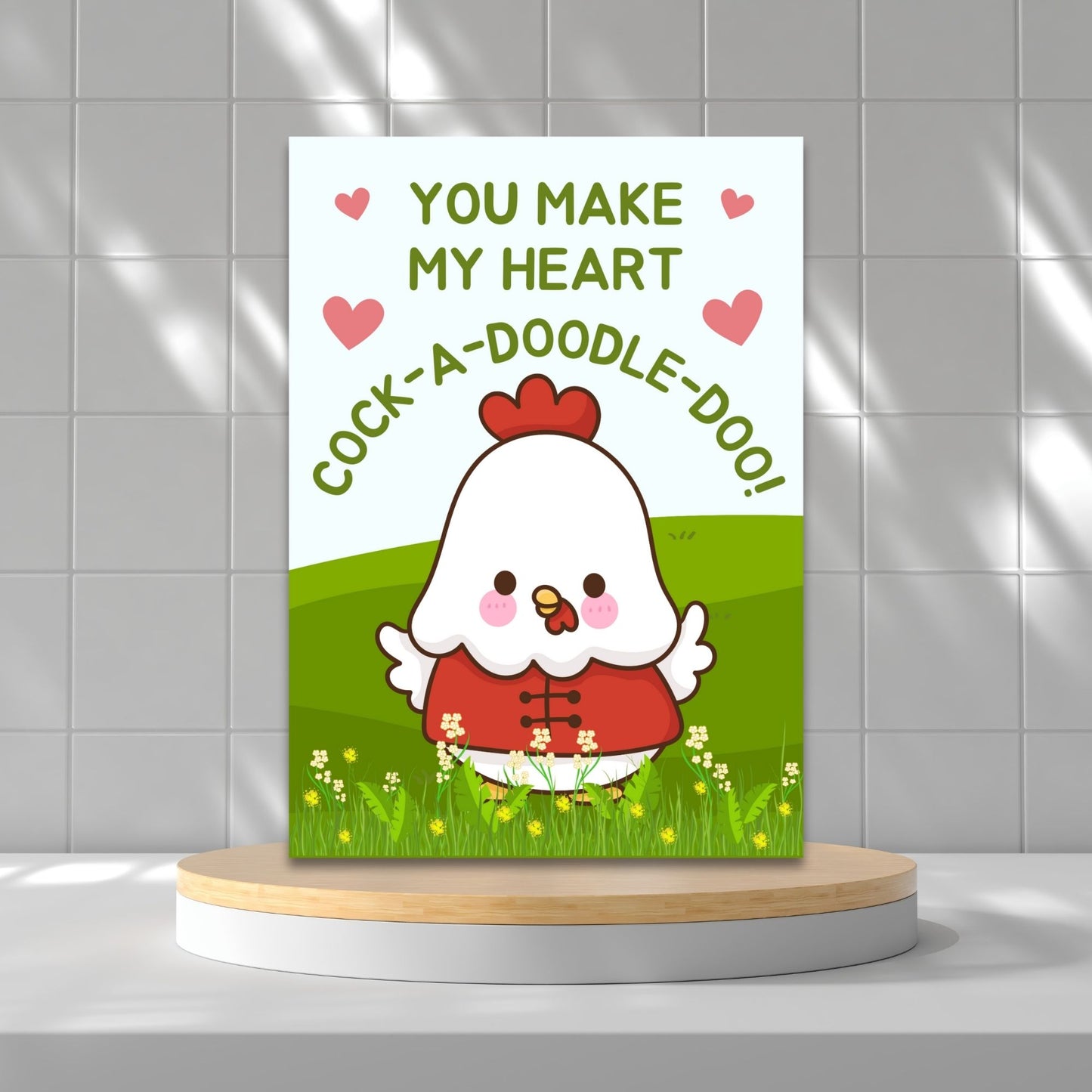 Printable Valentine’s Day Greeting Card featuring the phrase “You Make My Heart Cock-a-doodle-doo” with a rooster theme. Designed as a 5x7 PDF on an 8.5 x 11 sheet with two cards per page. A funny and punny Valentine’s card for loved ones.