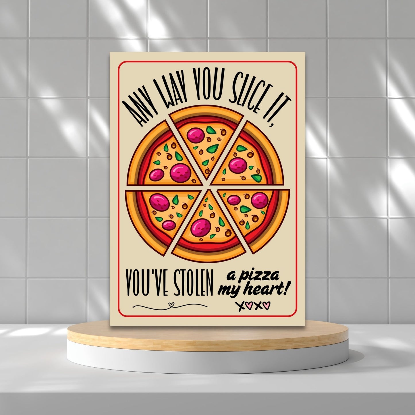 Printable Valentine’s Day Greeting Card with the pun “Any Way You Slice It, You’ve Stolen a Pizza My Heart.” Designed as a 5x7 PDF on an 8.5 x 11 sheet with two cards per page. A perfect punny Valentine’s card for pizza lovers!