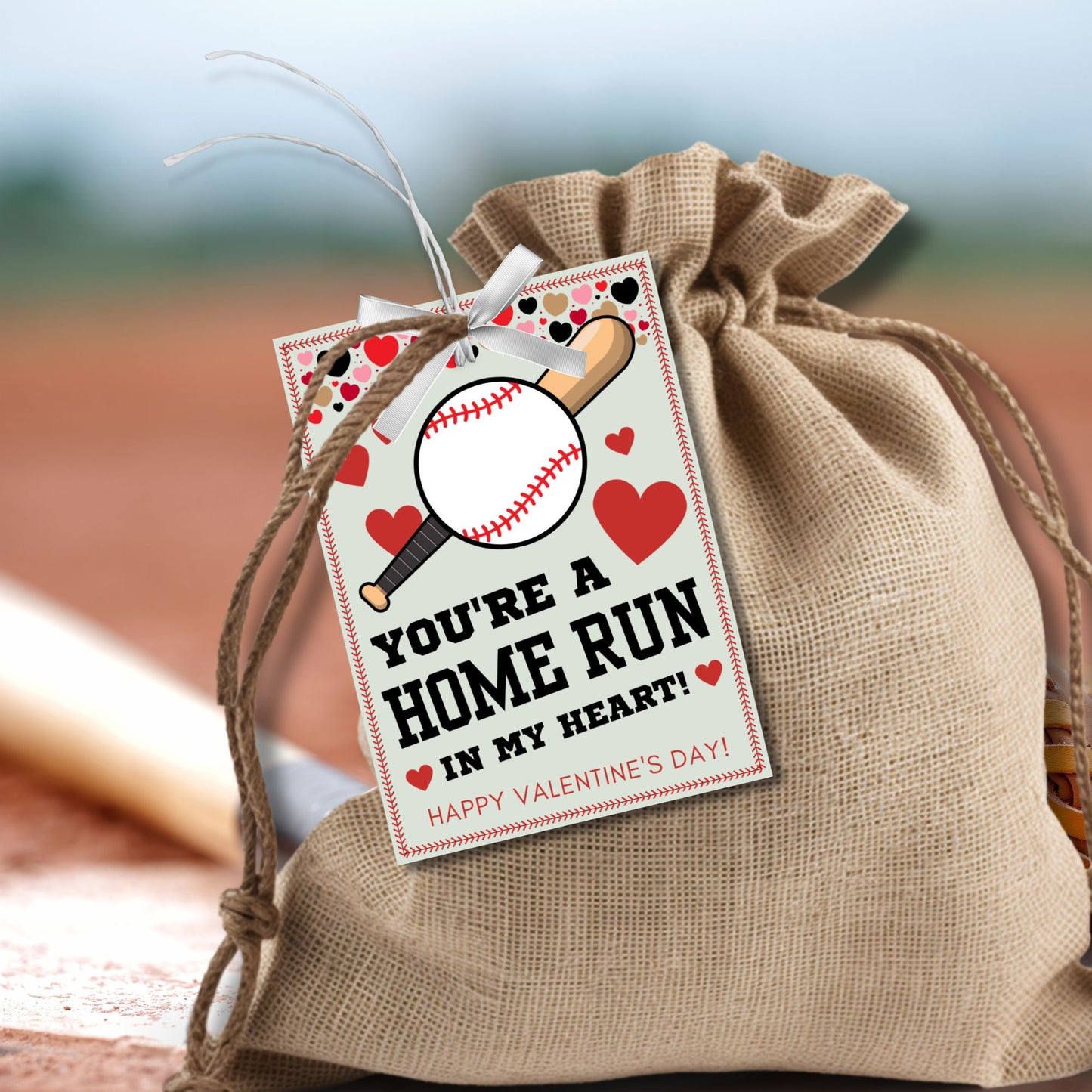 Printable and editable baseball-themed Valentine’s Day gift tags with the message "You’re a Home Run in My Heart." Features a baseball bat, ball, and hearts, perfect for teammates, coaches, and sports lovers.