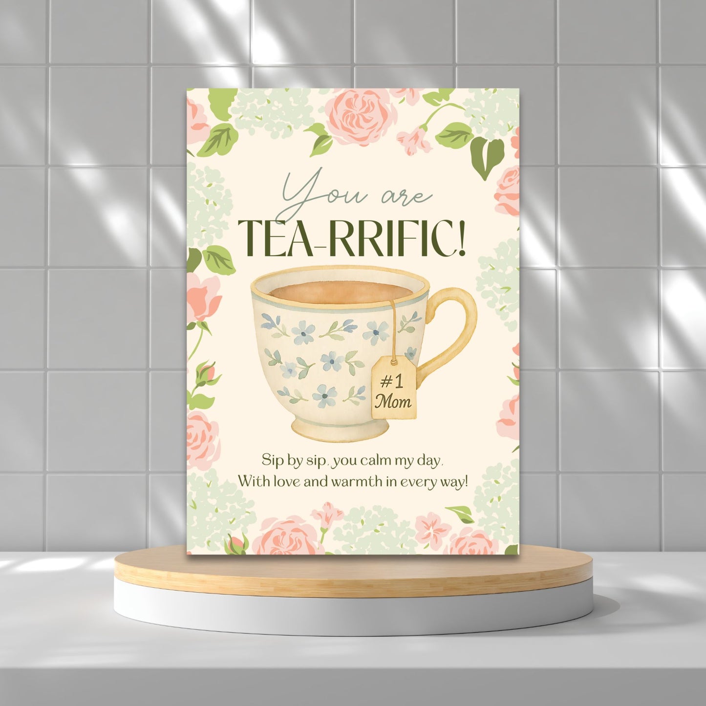 Printable 5x7 Mother’s Day card featuring a teacup and the pun "You Are Tea-rific," with pastel illustrations, available as an instant download PDF.