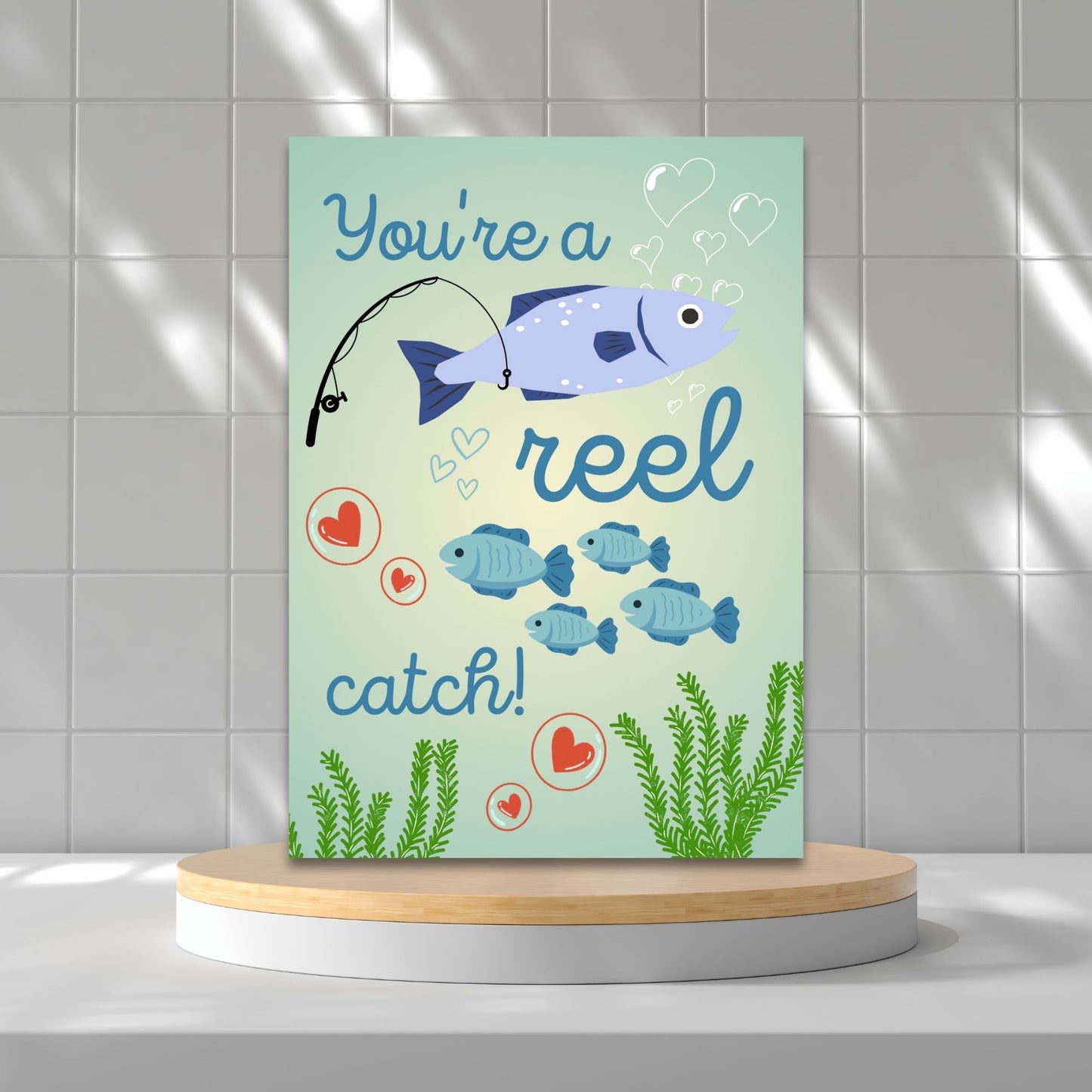 Printable Valentine’s Day Greeting Card with the pun “You're a Reel Catch.” Designed as a 5x7 PDF on an 8.5 x 11 sheet with two cards per page. A fun and punny Valentine’s card for fishing lovers!