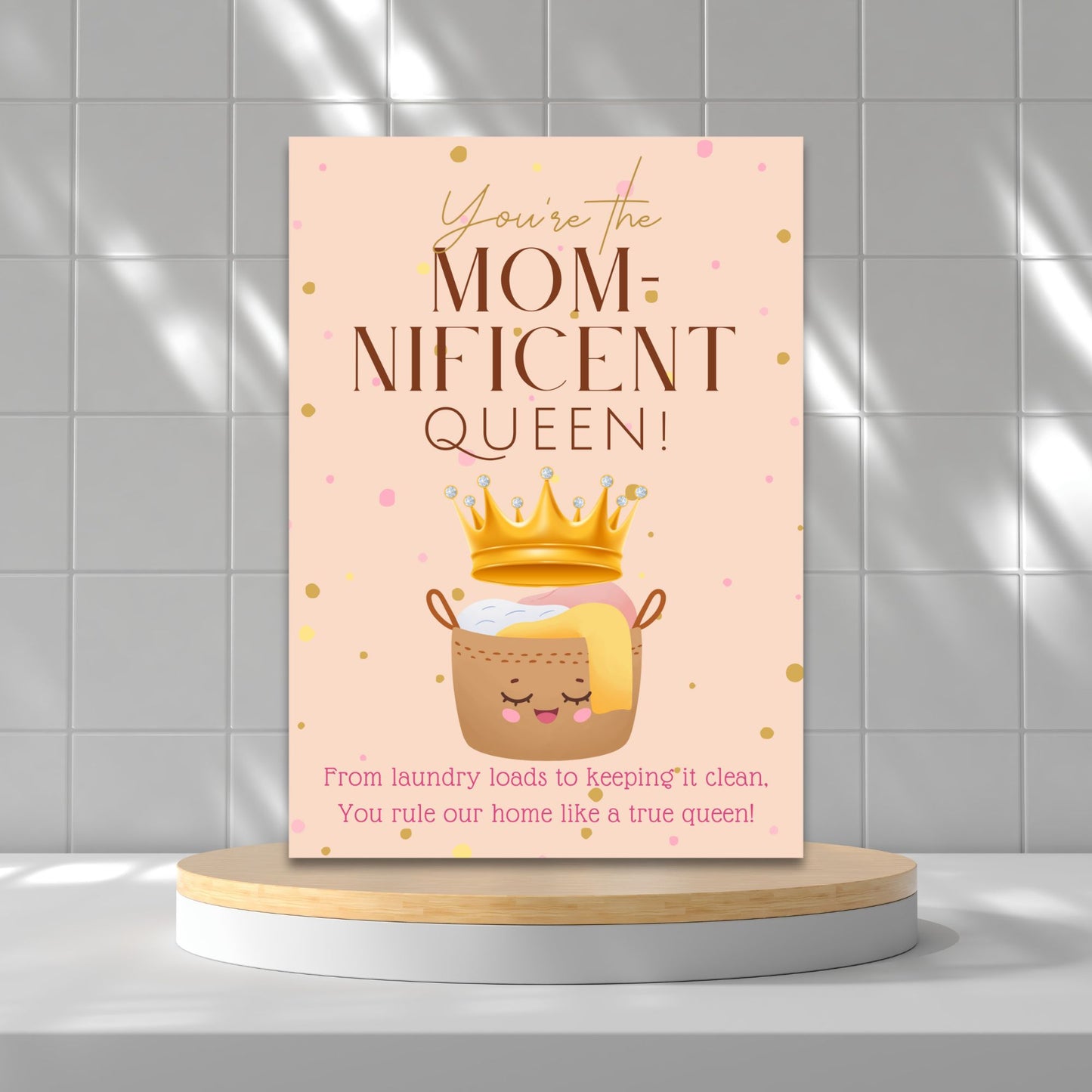 Printable 5x7 Mother's Day card with a crown illustration and the phrase “You’re the Momnificent Queen,” styled with regal, elegant design and bright colors, available as an instant download PDF.