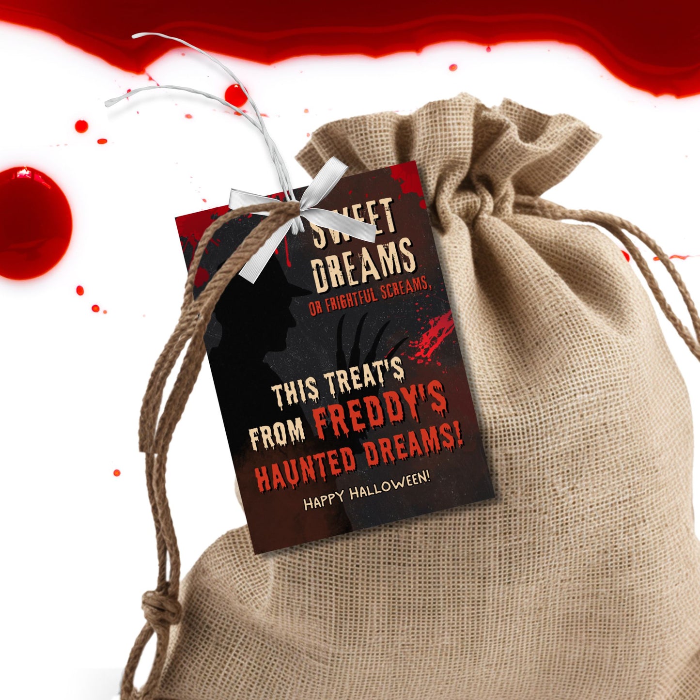 Halloween-themed gift tag on a burlap bag with red blood splatter