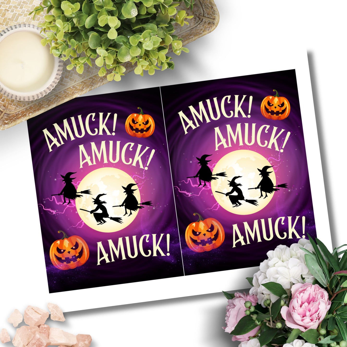 Two Halloween-themed posters with 'AMUCK! AMUCK! AMUCK!' text, pumpkins, and witches on a purple background. Surrounding elements include flowers and a candle.
