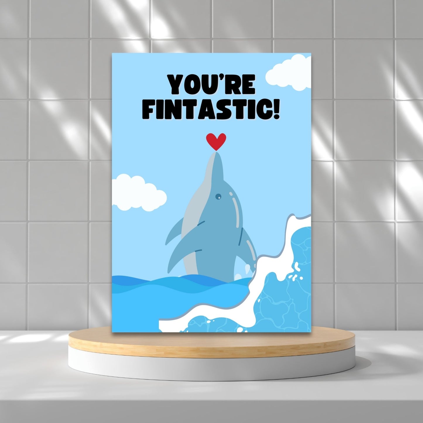 Printable Valentine’s Day Greeting Card featuring the phrase “You’re Fintastic” with a dolphin theme. Designed as a 5x7 PDF on an 8.5 x 11 sheet with two cards per page. A cute and punny Valentine’s card for dolphin and ocean lovers.
