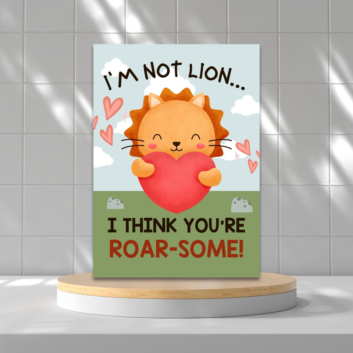 Printable Valentineās Day Greeting Card featuring the pun āIām Not Lion, I Think Youāre Roarsomeā with a lion theme. Designed as a 5x7 PDF on an 8.5 x 11 sheet with two cards per page. A fun and bold Valentineās card for animal lovers.