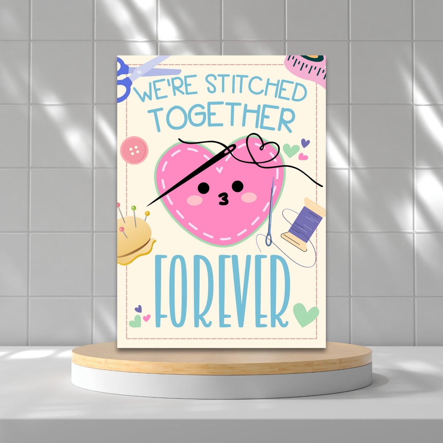 Printable Valentineās Day Greeting Card featuring the phrase āWe're Stitched Together Forever.ā Designed as a 5x7 PDF on an 8.5 x 11 sheet with two cards per page. A heartfelt and meaningful Valentineās card for couples and best friends.