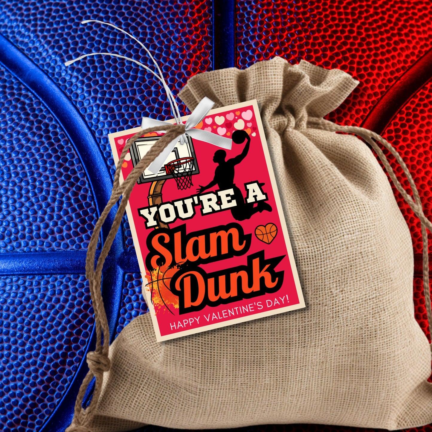 Printable and editable basketball-themed Valentineās Day gift tags with the message "Youāre a Slam Dunk." Features a red and black design with a basketball hoop and hearts, perfect for teammates, coaches, and sports lovers.