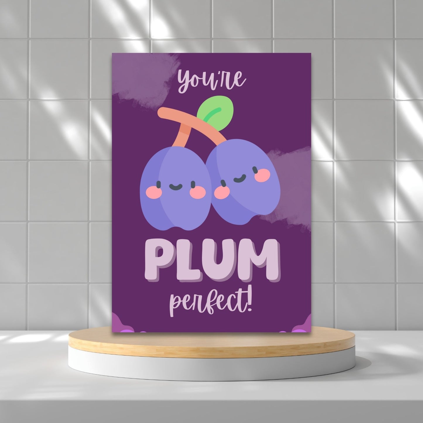 Printable Valentine’s Day Greeting Card featuring the phrase “You’re Plum Perfect” with a plum design. Designed as a 5x7 PDF on an 8.5 x 11 sheet with two cards per page. A sweet and punny Valentine’s card for loved ones.