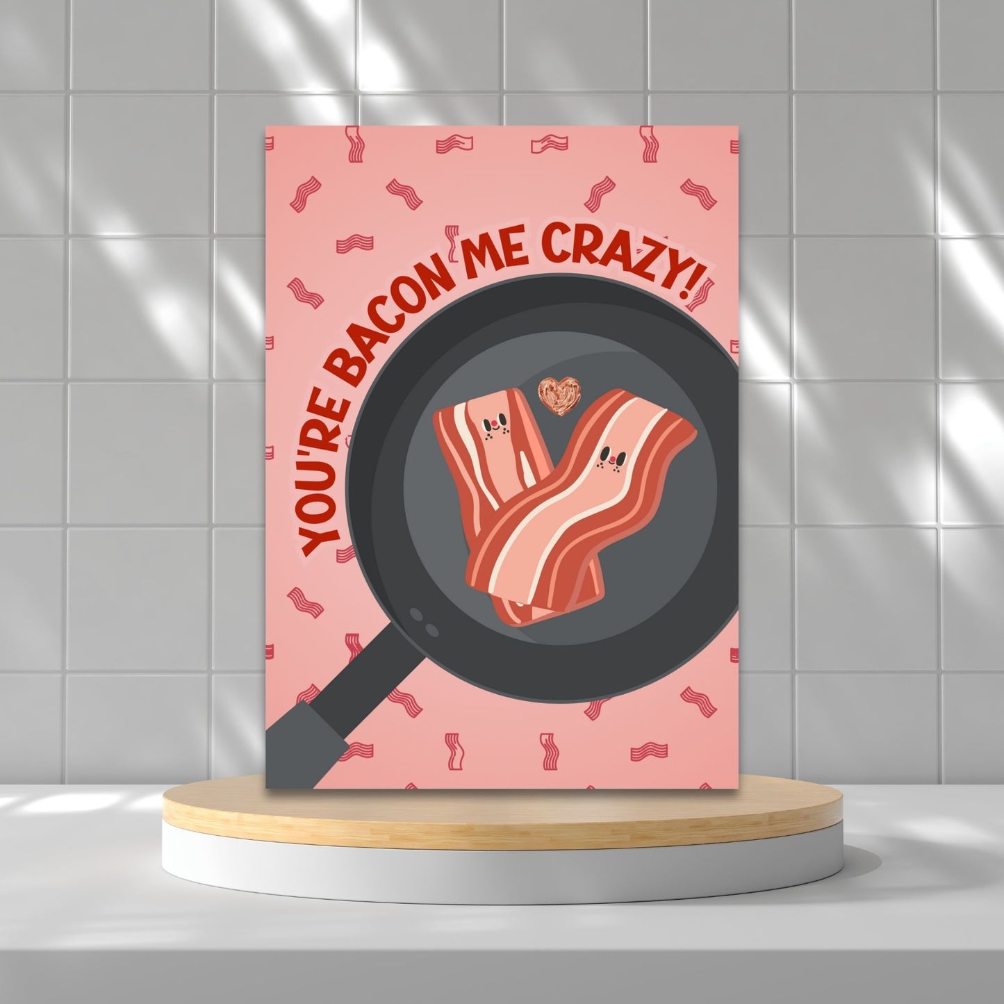 Printable Valentine’s Day Greeting Card featuring the phrase “You’re Bacon Me Crazy” with a bacon theme. Designed as a 5x7 PDF on an 8.5 x 11 sheet with two cards per page. A fun and punny Valentine’s card for bacon lovers and friends.