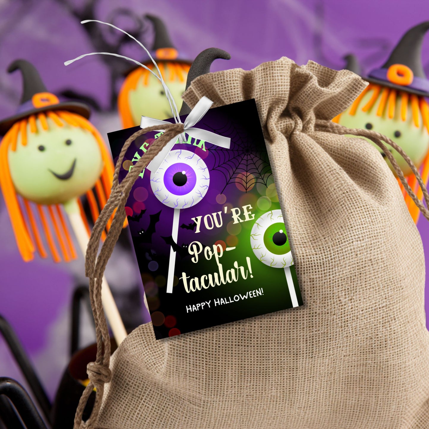 Halloween gift tag with a spooky eyeball cake pop design and the message 'Eye Think You're Pop-tacular!' for cake pop-themed treats.