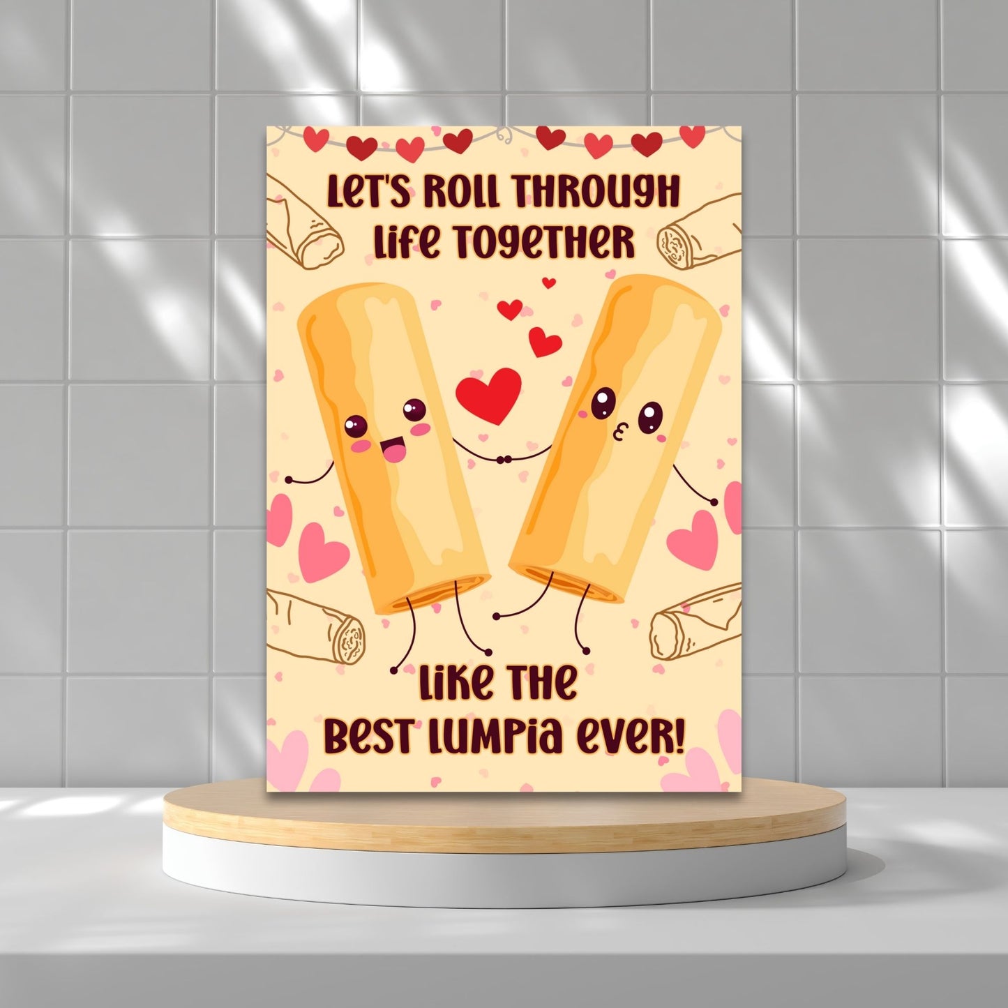 Printable Valentineās Day card featuring the phrase āLetās Roll Through Life Together Like the Best Lumpia Everā with a Filipino Lumpia-inspired design. Designed as a 5x7 PDF on an 8.5 x 11 sheet with two cards per page. A punny and heartfelt Valentineās card for Filipino food lovers.
