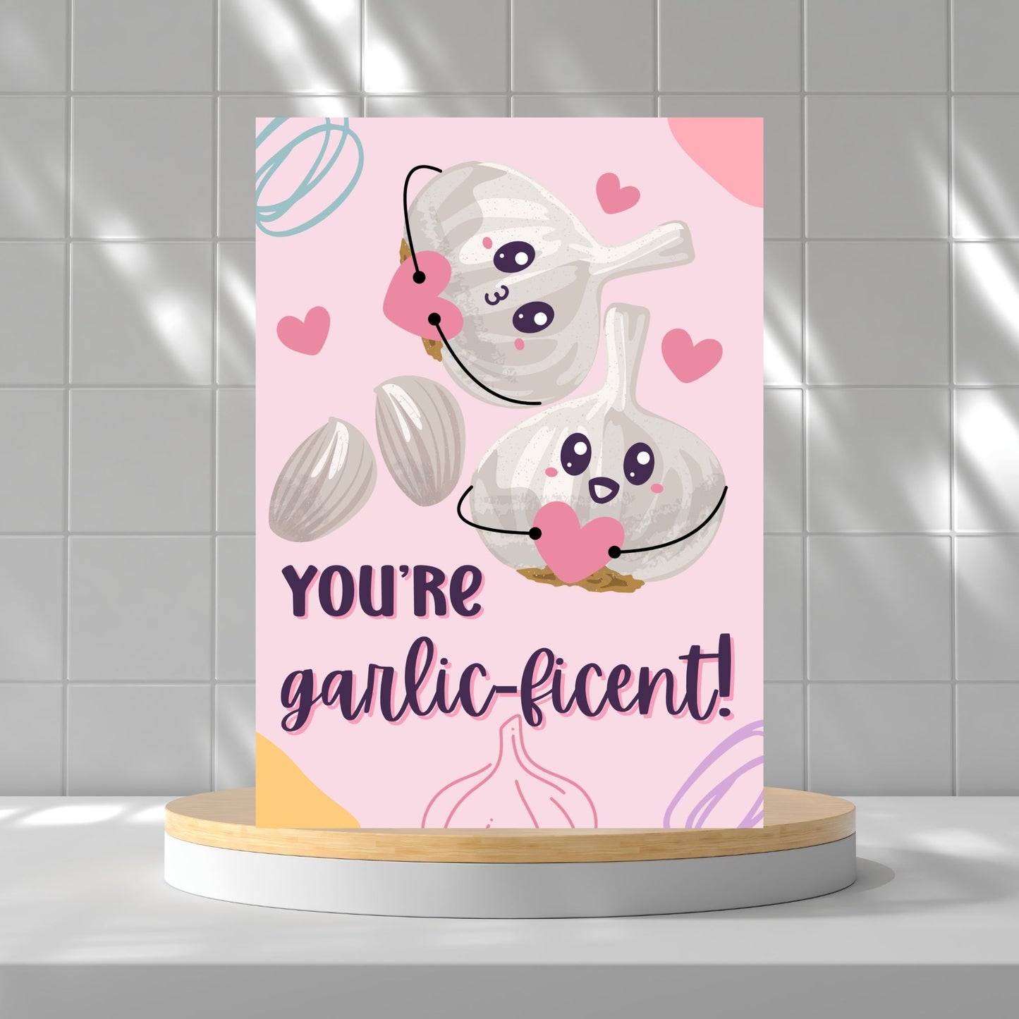 Printable Valentine’s Day Greeting Card featuring the phrase “You’re Garlicficent” with a cute garlic design. Designed as a 5x7 PDF on an 8.5 x 11 sheet with two cards per page. A punny and flavorful Valentine’s card for loved ones.