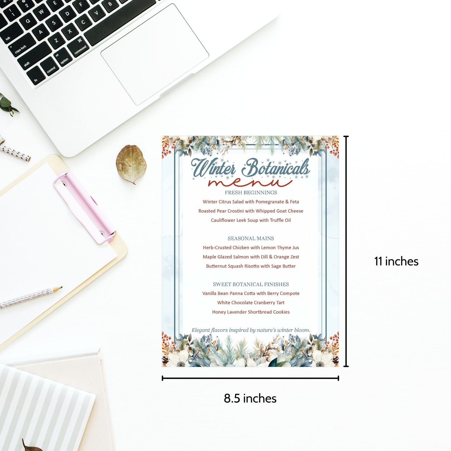 Winter Botanicals menu card on a desk with laptop and stationery items