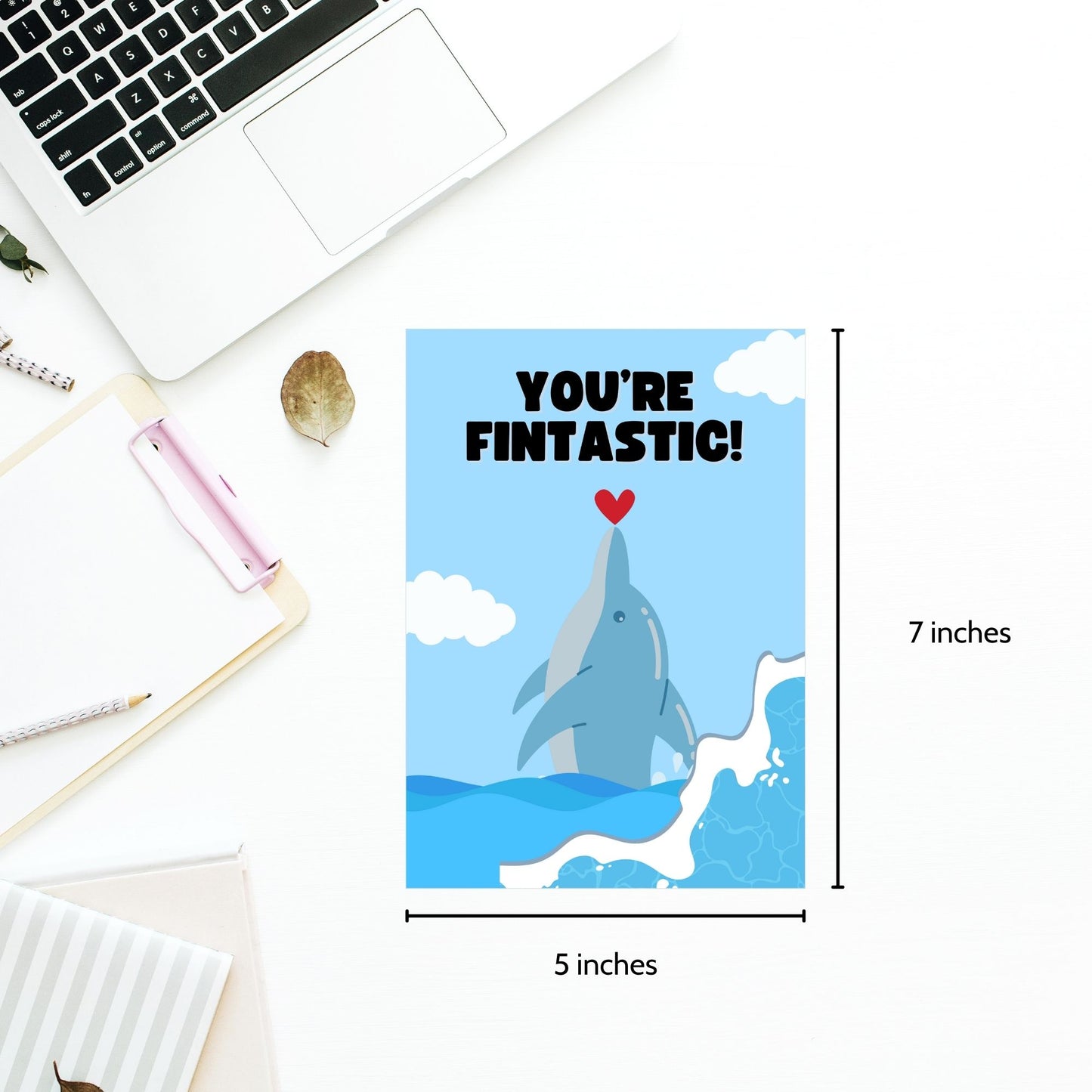 Printable Valentine’s Day Greeting Card featuring the phrase “You’re Fintastic” with a dolphin theme. Designed as a 5x7 PDF on an 8.5 x 11 sheet with two cards per page. A cute and punny Valentine’s card for dolphin and ocean lovers.