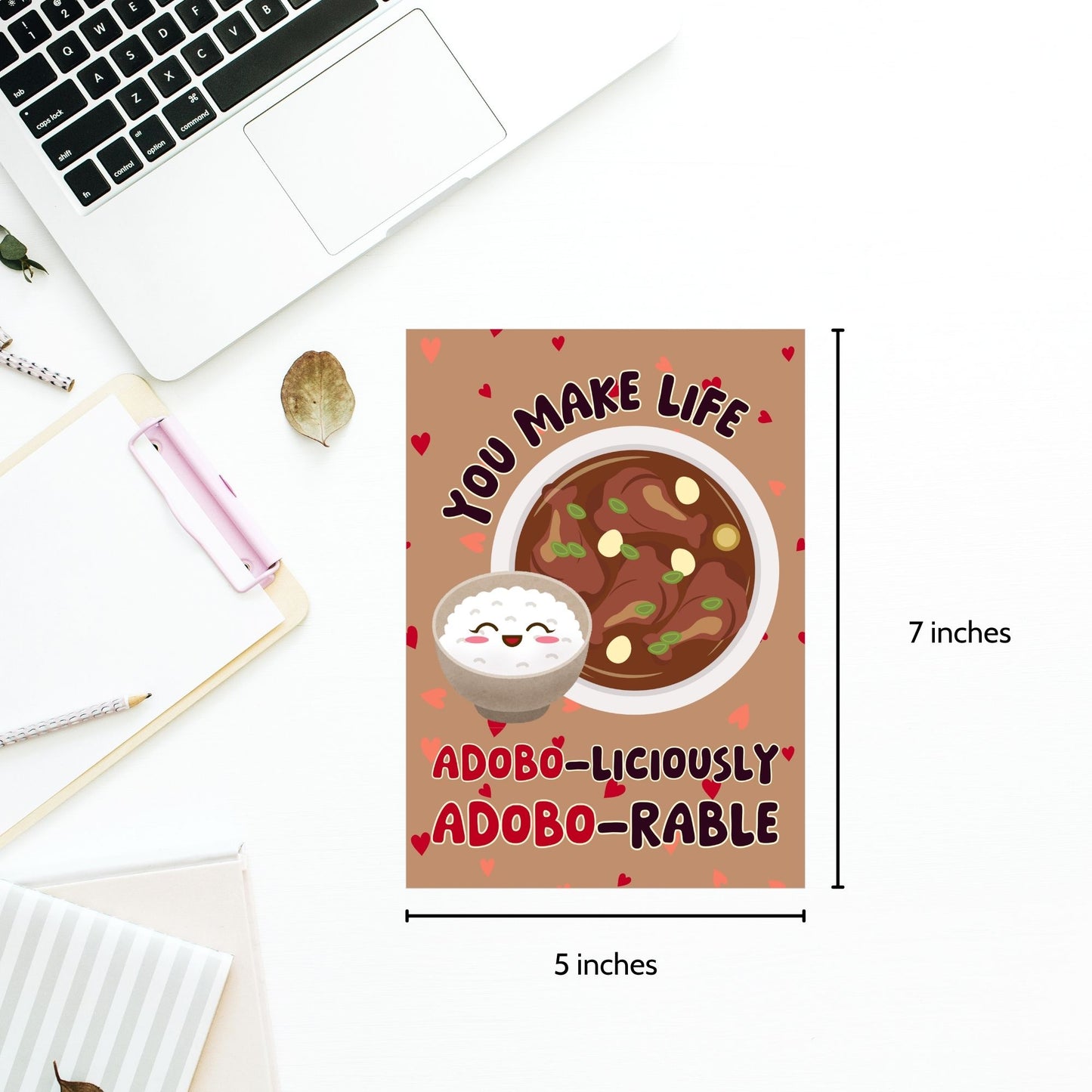 Printable Valentine’s Day card featuring the phrase “You Make Life Adoboliciously Adoborable” with a fun Adobo-themed design. Designed as a 5x7 PDF on an 8.5 x 11 sheet with two cards per page. A punny and heartfelt Valentine’s card for Filipino food lovers.
