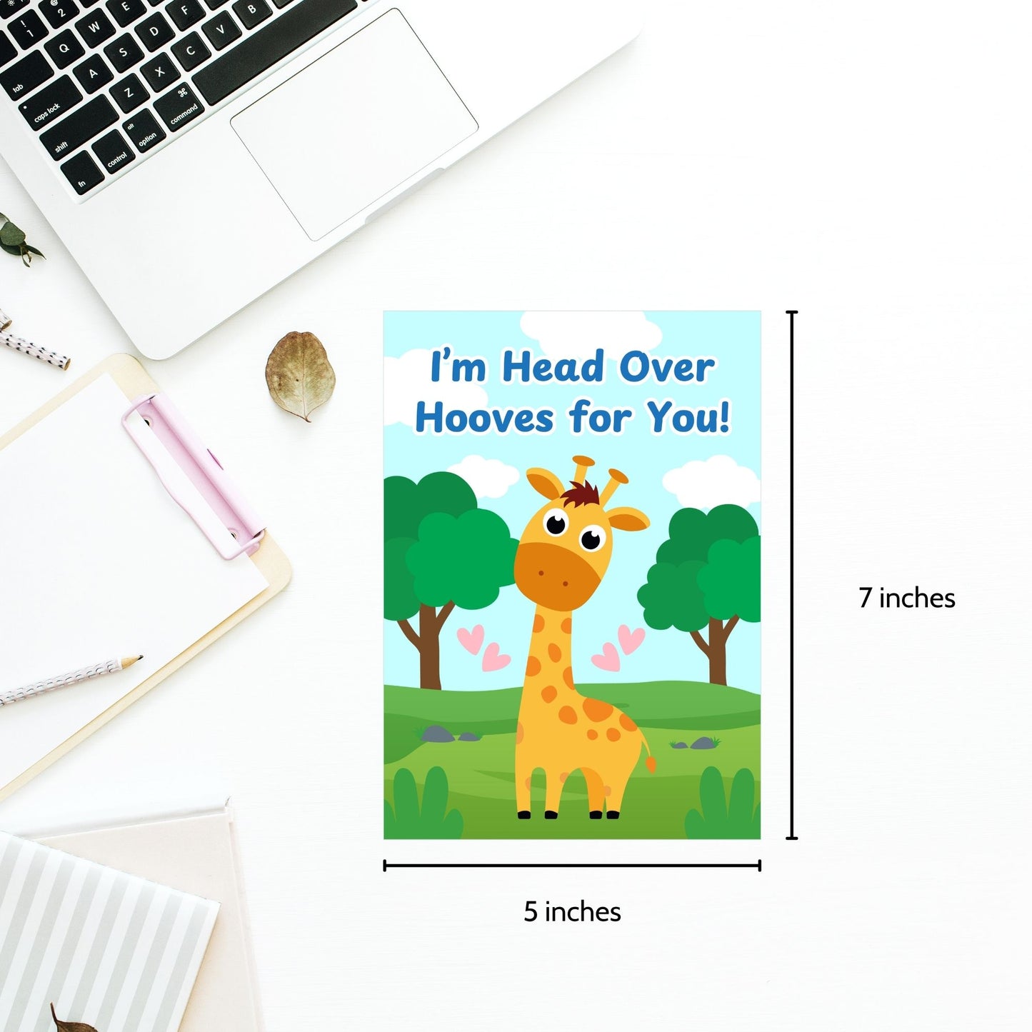Printable Valentine’s Day Greeting Card featuring the phrase “I’m Head Over Hooves for You” with a giraffe theme. Designed as a 5x7 PDF on an 8.5 x 11 sheet with two cards per page. A sweet and punny Valentine’s card for giraffe lovers and friends.