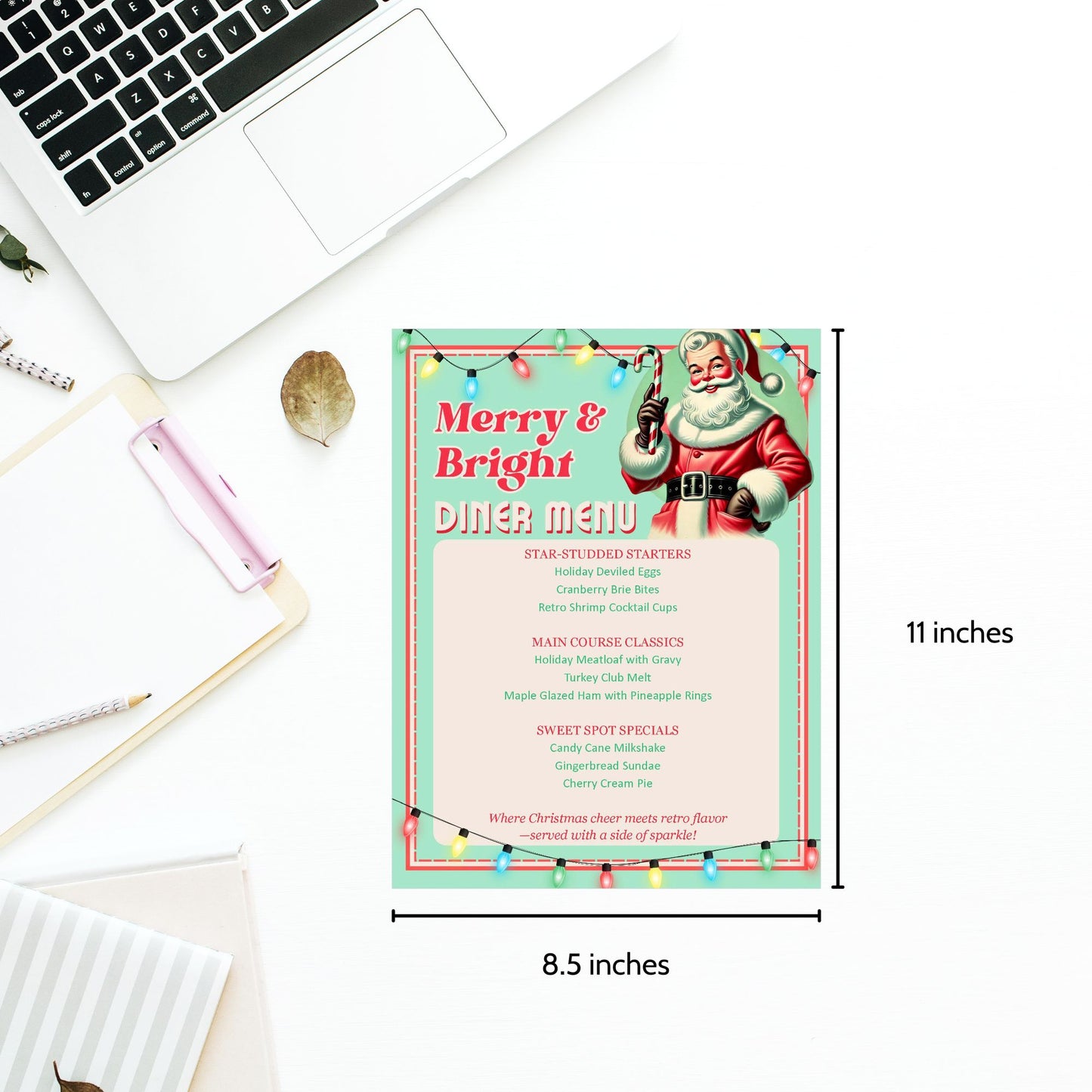 Christmas-themed diner menu with Santa Claus on a desk next to a laptop.