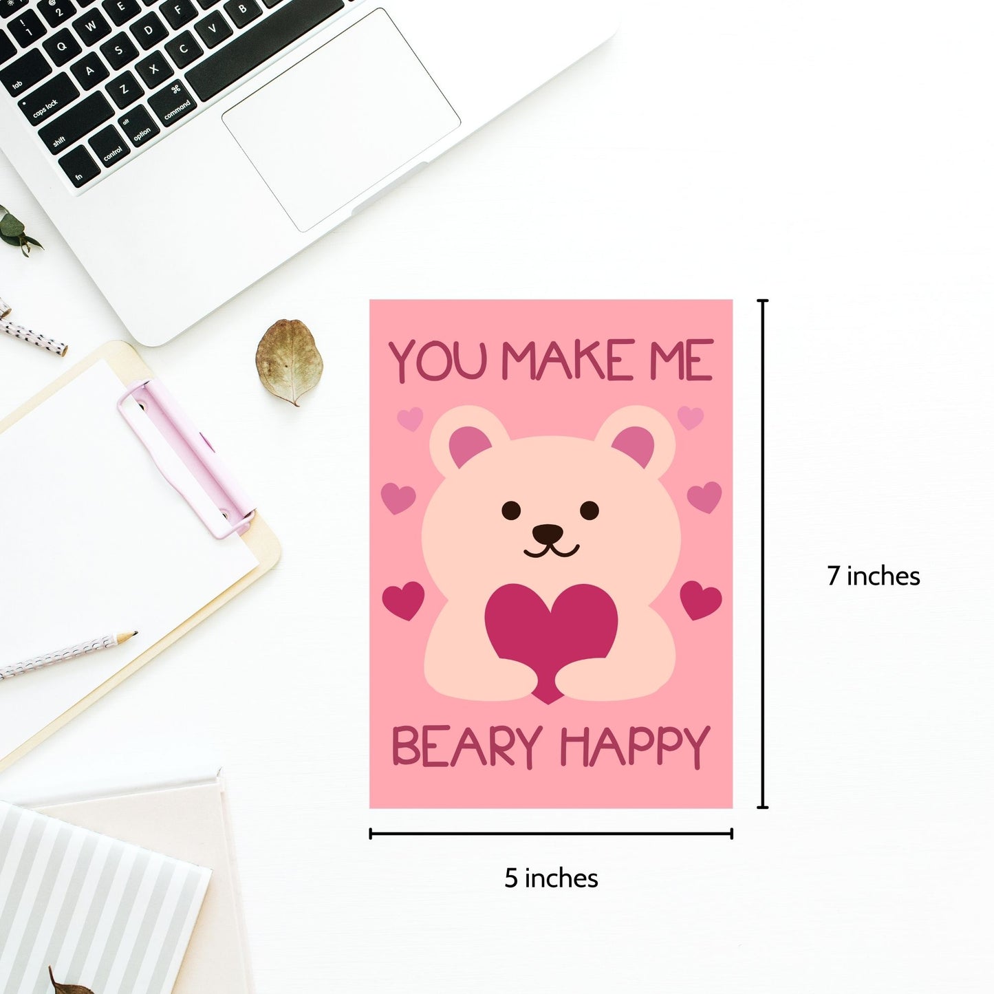 Printable Valentineās Day Greeting Card featuring the pun āYou Make Me Beary Happy.ā Designed as a 5x7 PDF on an 8.5 x 11 sheet with two cards per page. A cute and heartfelt Valentineās card for loved ones.