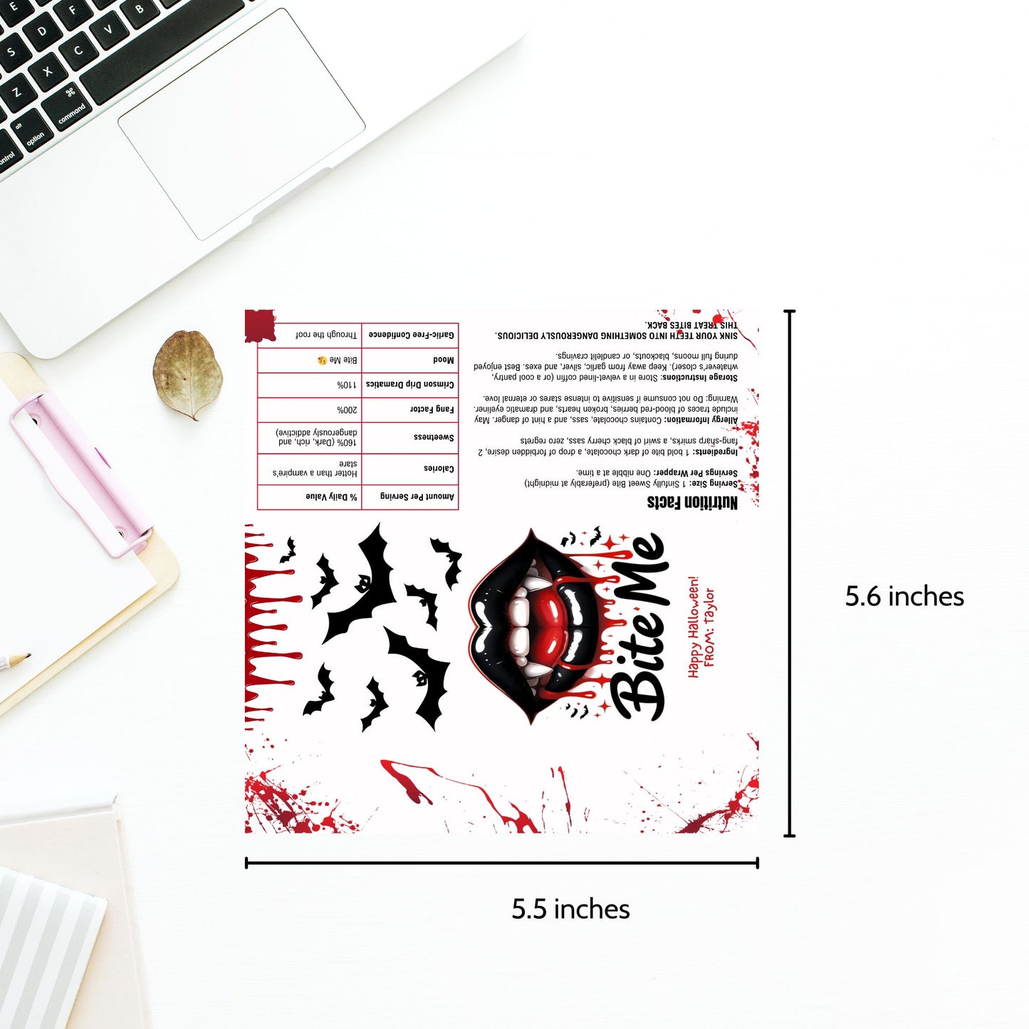 Product with 'Bite Me' design and measurements on a desk