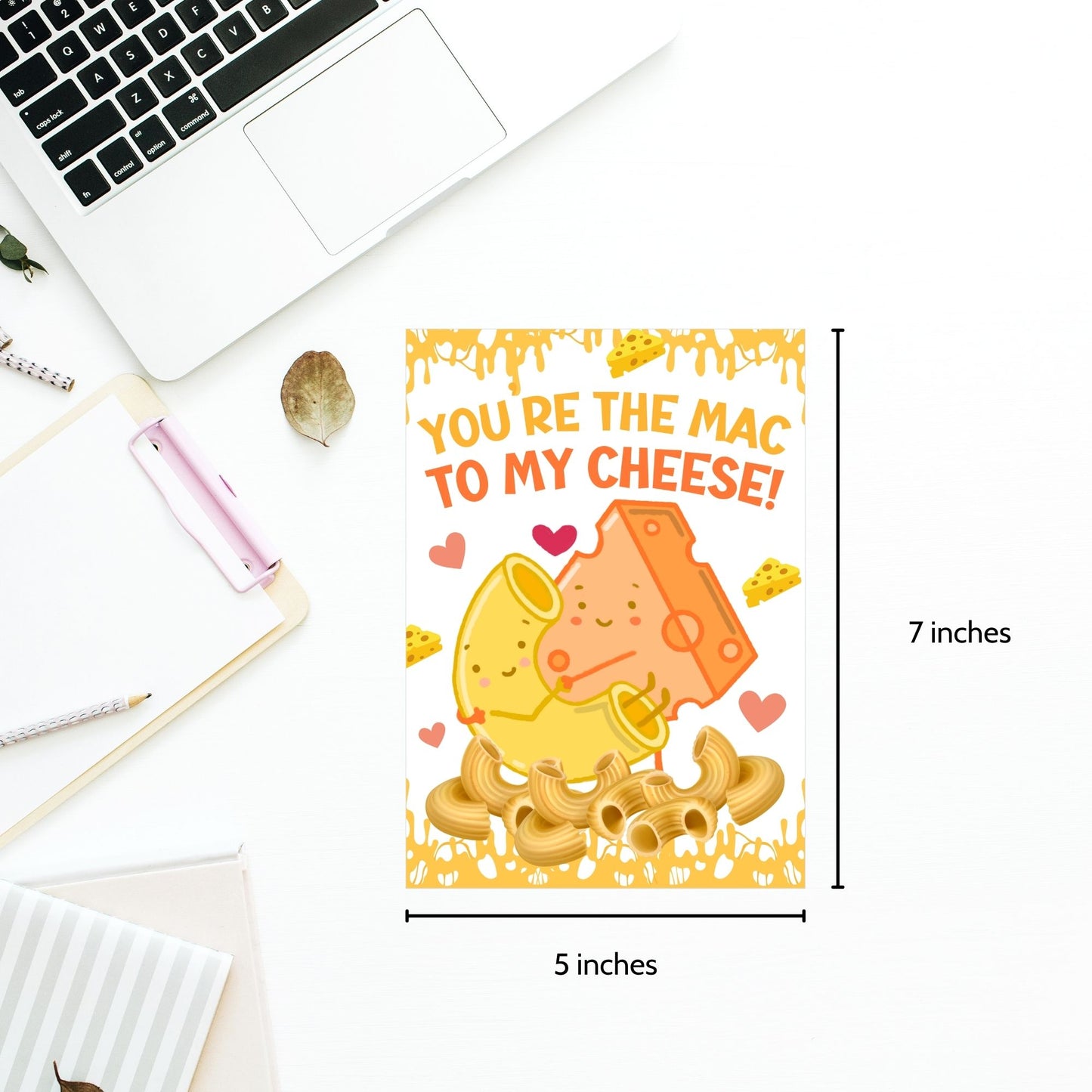 Printable Valentine’s Day Greeting Card featuring the phrase “You’re the Mac to My Cheese” with a mac and cheese theme. Designed as a 5x7 PDF on an 8.5 x 11 sheet with two cards per page. A fun and heartfelt Valentine’s card for loved ones.