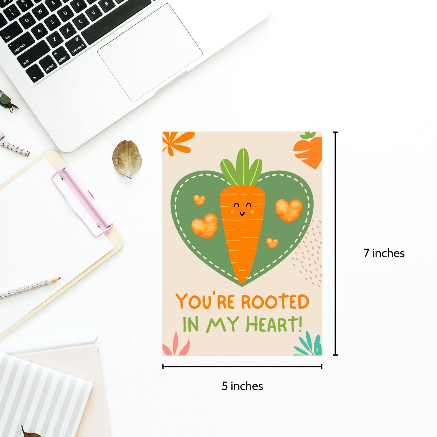 Printable Valentine’s Day Greeting Card featuring the phrase “You’re Rooted in My Heart” with a carrot theme. Designed as a 5x7 PDF on an 8.5 x 11 sheet with two cards per page. A sweet and punny Valentine’s card for veggie lovers and friends.