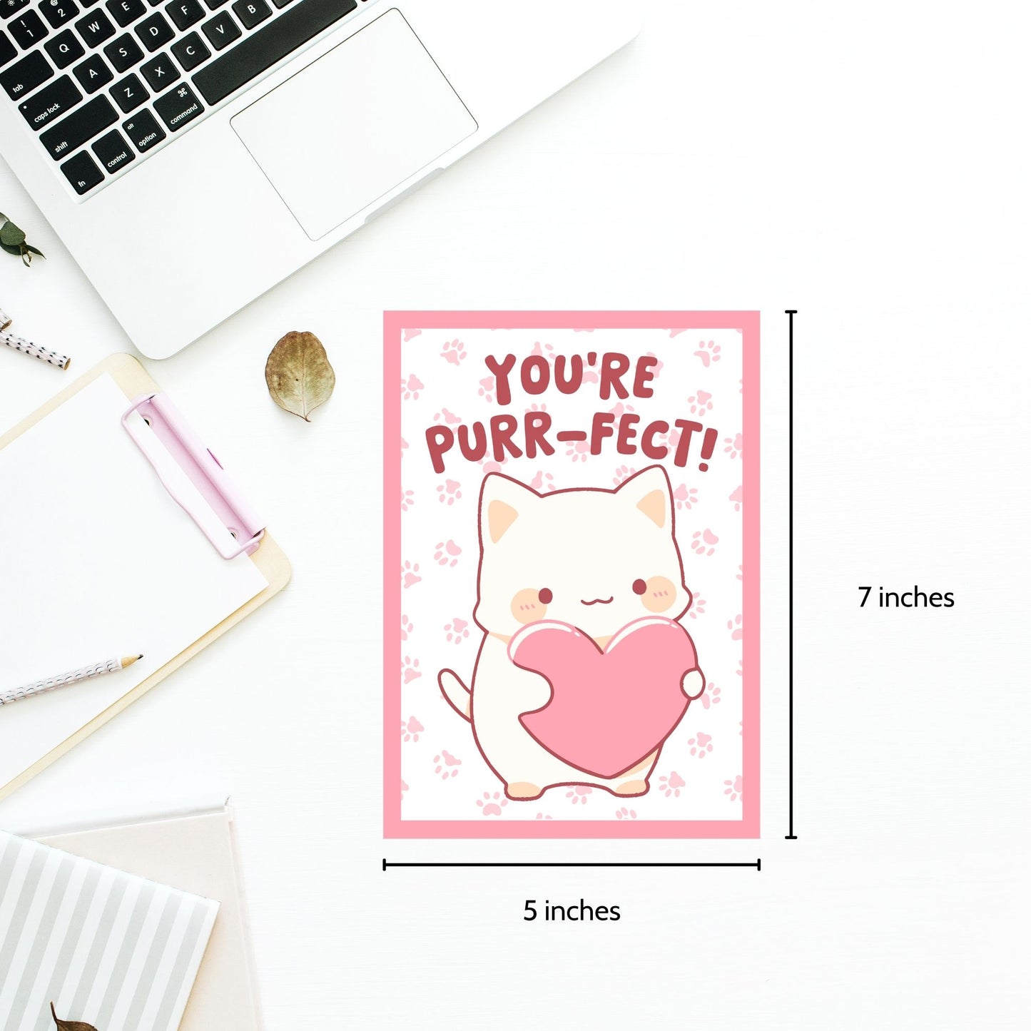 Printable Valentineās Day Greeting Card featuring the phrase āYou're Purrfect.ā Designed as a 5x7 PDF on an 8.5 x 11 sheet with two cards per page. A cute and fun Valentineās card for cat lovers.