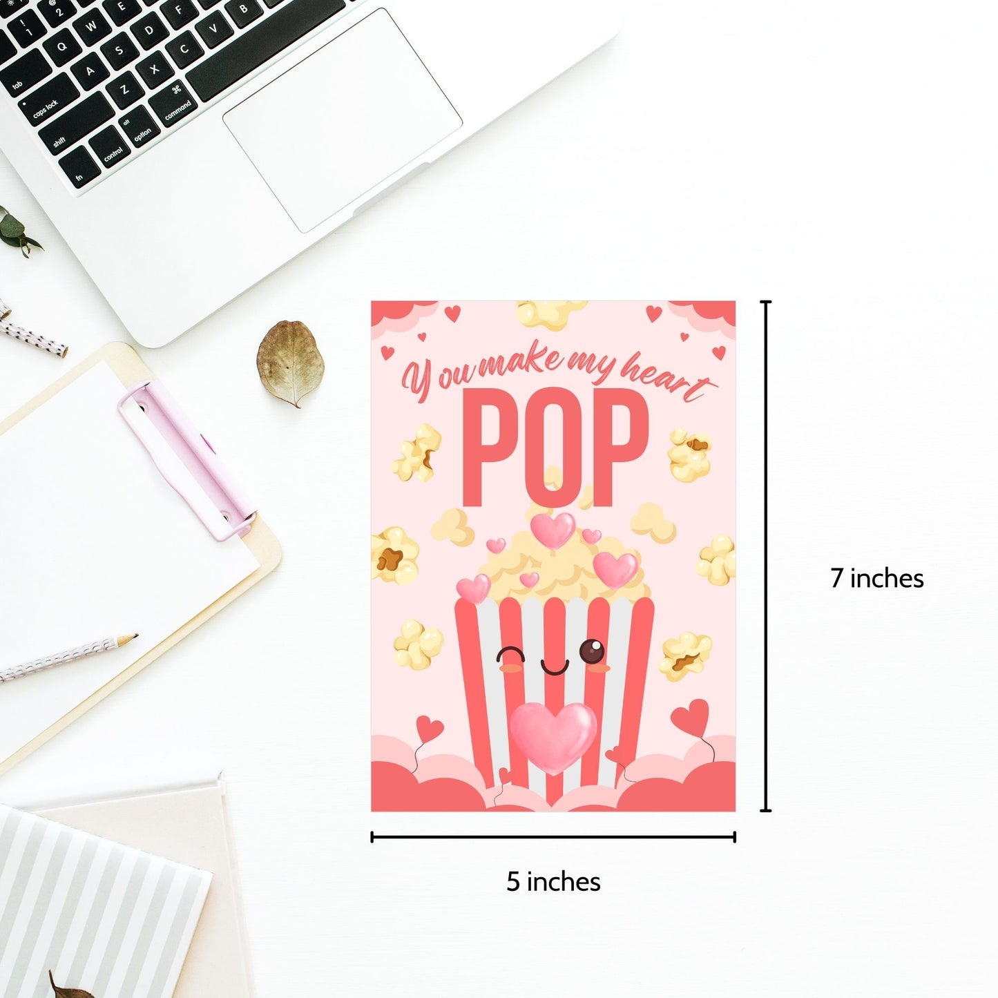 Printable Valentineās Day Greeting Card featuring the phrase āYou Make My Heart Popā with a popcorn theme. Designed as a 5x7 PDF on an 8.5 x 11 sheet with two cards per page. A fun and whimsical Valentineās card for movie and snack lovers.