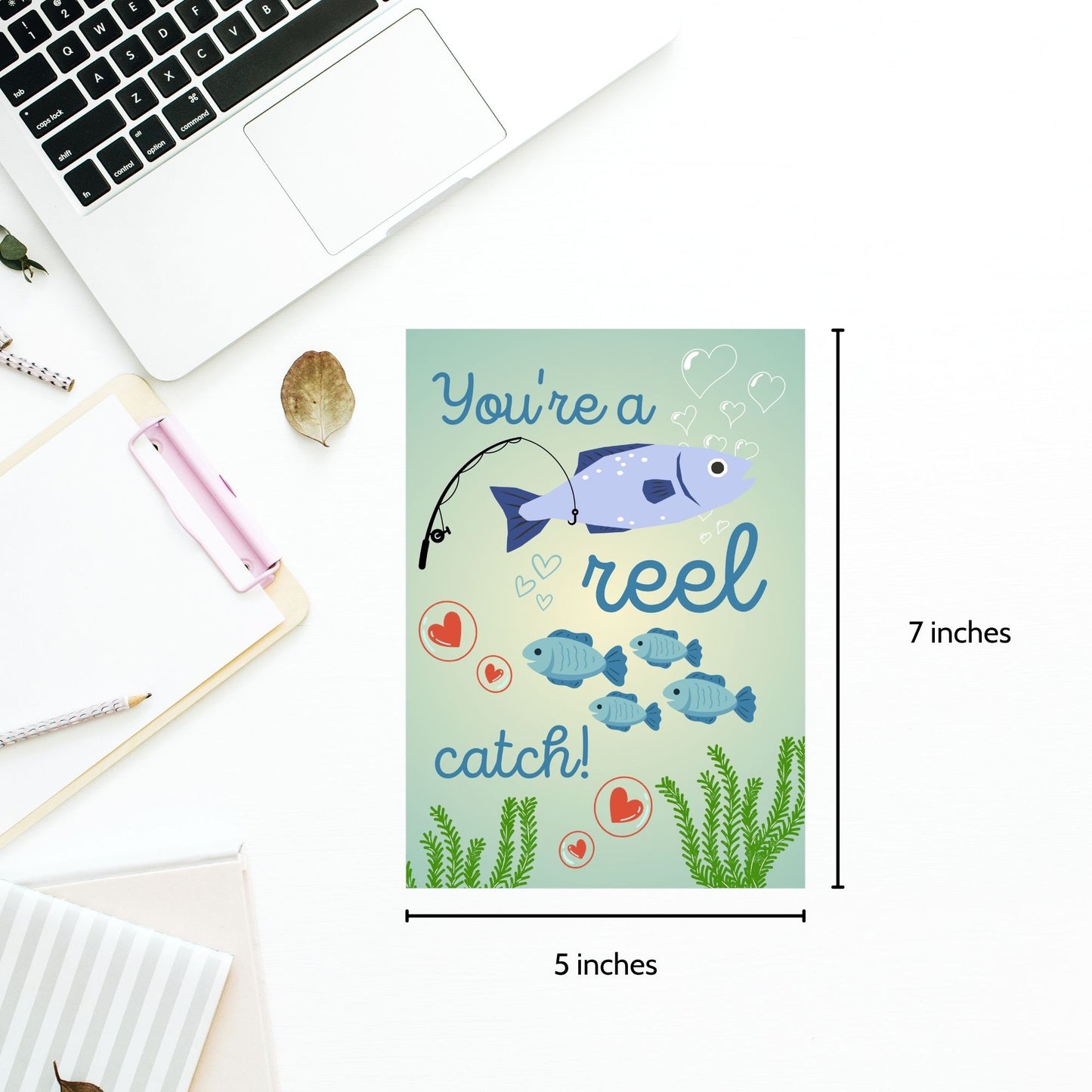 Printable Valentine’s Day Greeting Card with the pun “You're a Reel Catch.” Designed as a 5x7 PDF on an 8.5 x 11 sheet with two cards per page. A fun and punny Valentine’s card for fishing lovers!