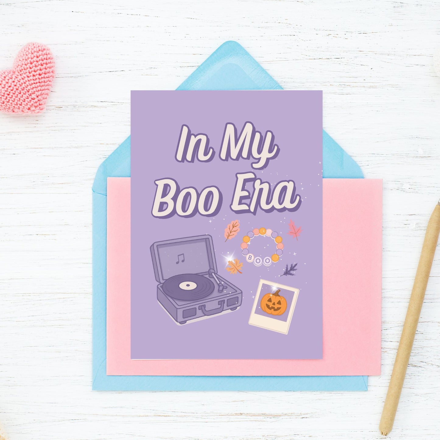 Greeting card with 'In My Boo Era' text and record player illustration on a colorful envelope.