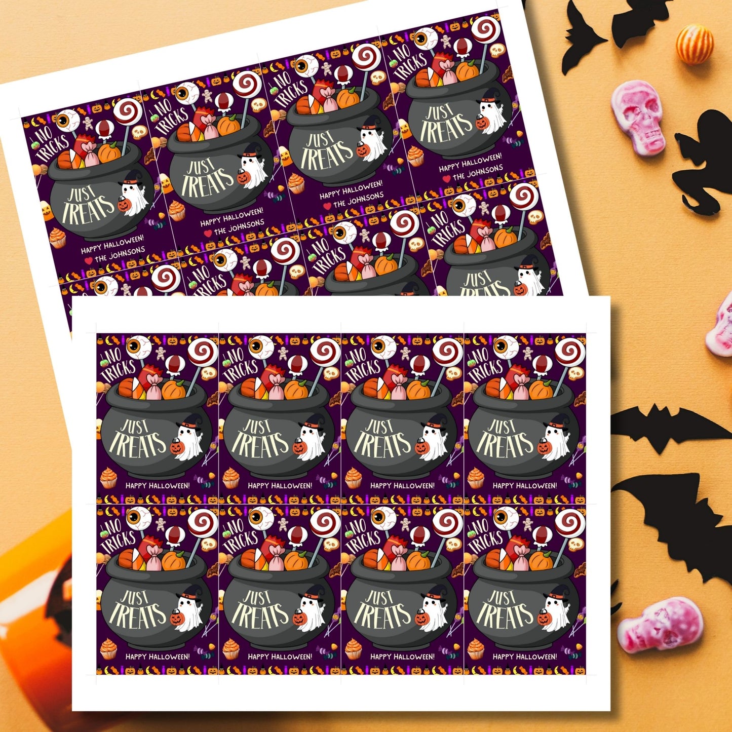 Halloween-themed printable gift tags with the message "No Tricks, Just Treats" featuring a cauldron filled with Halloween candies and treats. Tags are 2.5 x 3.5 inches, laid out 8 per sheet on a standard 8.5 x 11-inch page. Includes a printable PDF and a PDF with a link to an editable Canva template.