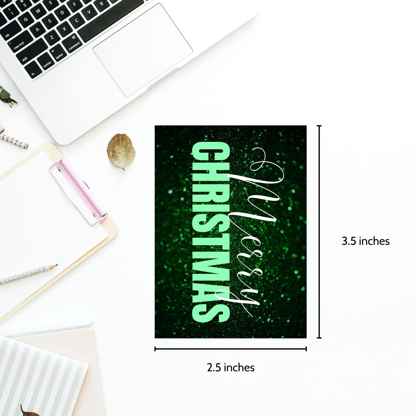 Green-themed ready-to-print Christmas gift tags featuring a glittery green background with elegant "Merry Christmas" text, 2.5 x 3.5 inches, 8 per 8.5 x 11-inch sheet.