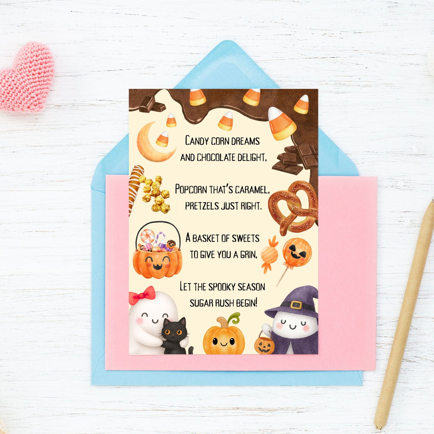 Halloween-themed card with candy-themed illustrations on a white background