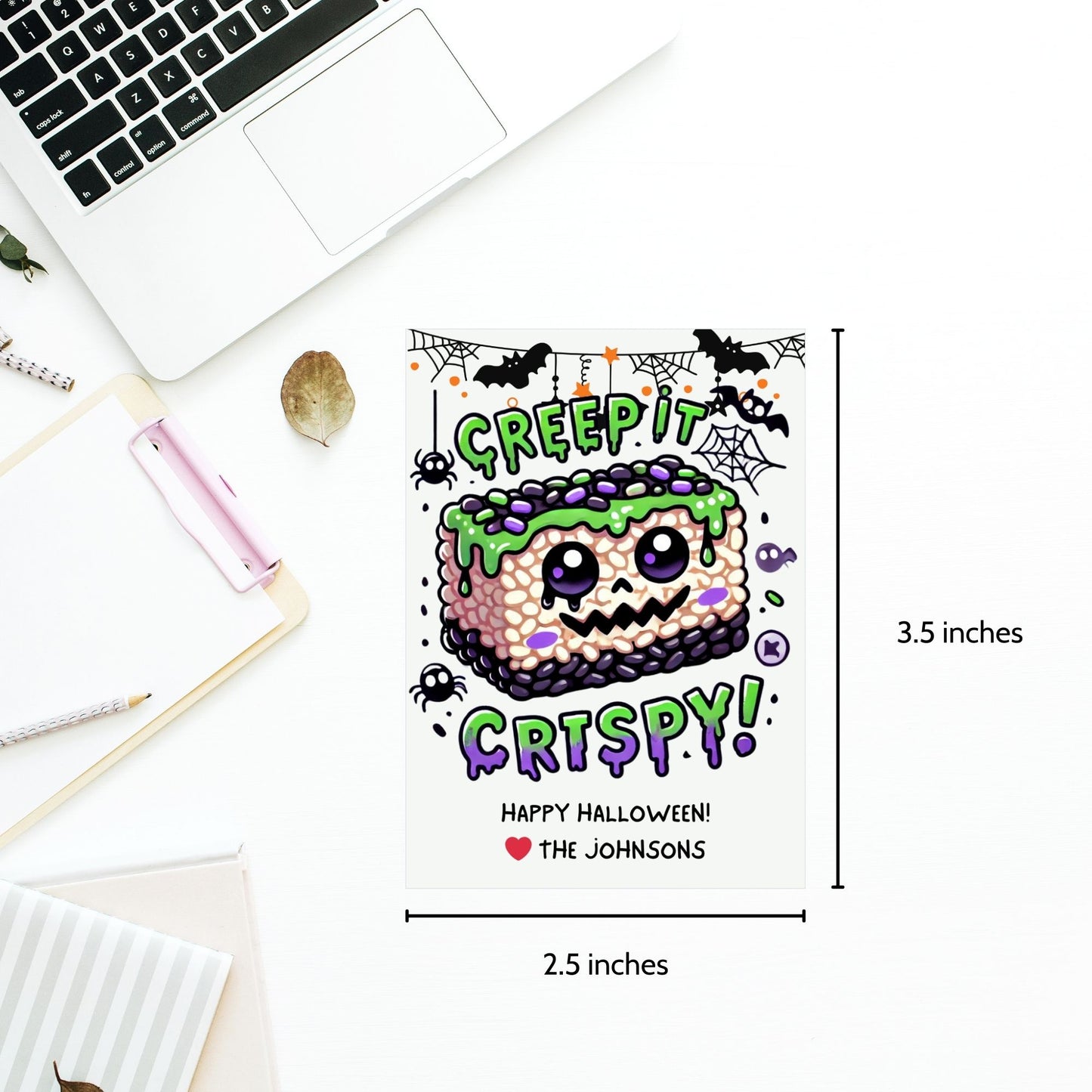 Halloween-themed printable gift tags featuring a spooky rice krispie treat with green frosting and purple sprinkles. The tag reads "Creep It Crispy!" Perfect for Halloween treats, sized 2.5 x 3.5 inches, laid out 8 per sheet. Includes a printable PDF and a link to an editable Canva template.