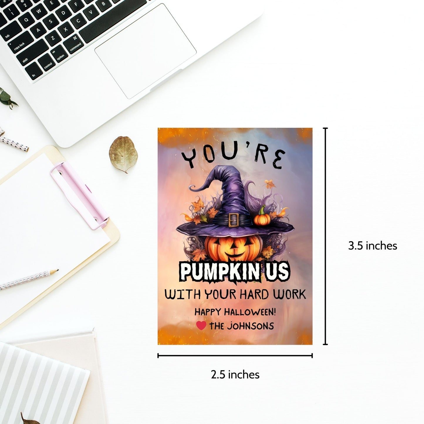 Halloween-themed printable gift tags with the message "You're Pumpkin Us With Your Hard Work" featuring a festive pumpkin in a witch's hat on a Halloween background. Tags are 2.5 x 3.5 inches, laid out 8 per sheet on a standard 8.5 x 11-inch page. Includes a printable PDF and a PDF with a link to an editable Canva template.