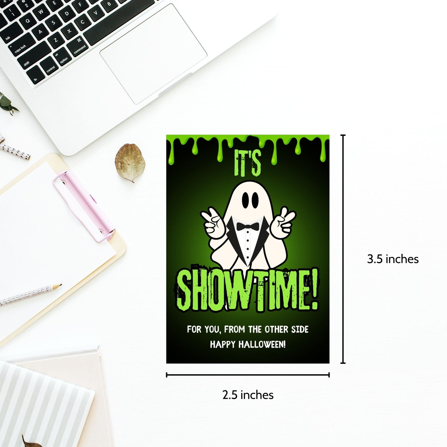 Halloween gift tag design inspired by Beetlejuice with the phrase "It's Showtime!" featuring a ghost in a tuxedo on a green dripping goo background. Sized at 2.5 x 3.5 inches, these tags are laid out 8 per sheet, perfect for dressing up Halloween treats.