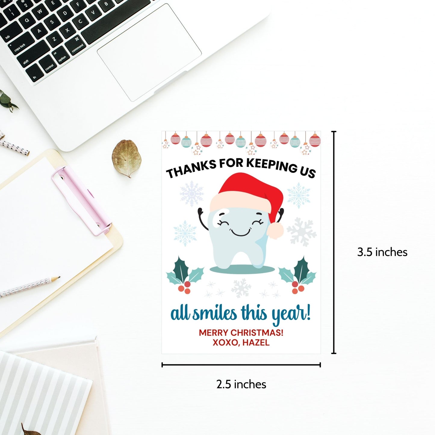 A festive set of 8 editable holiday gift tags with the message 'Thanks for Keeping Us All Smiles This Year!' featuring a smiling tooth in a Santa hat, holly, snowflakes, and hanging baubles. Perfect for dentists and dental offices to use for holiday gifts or client appreciation.