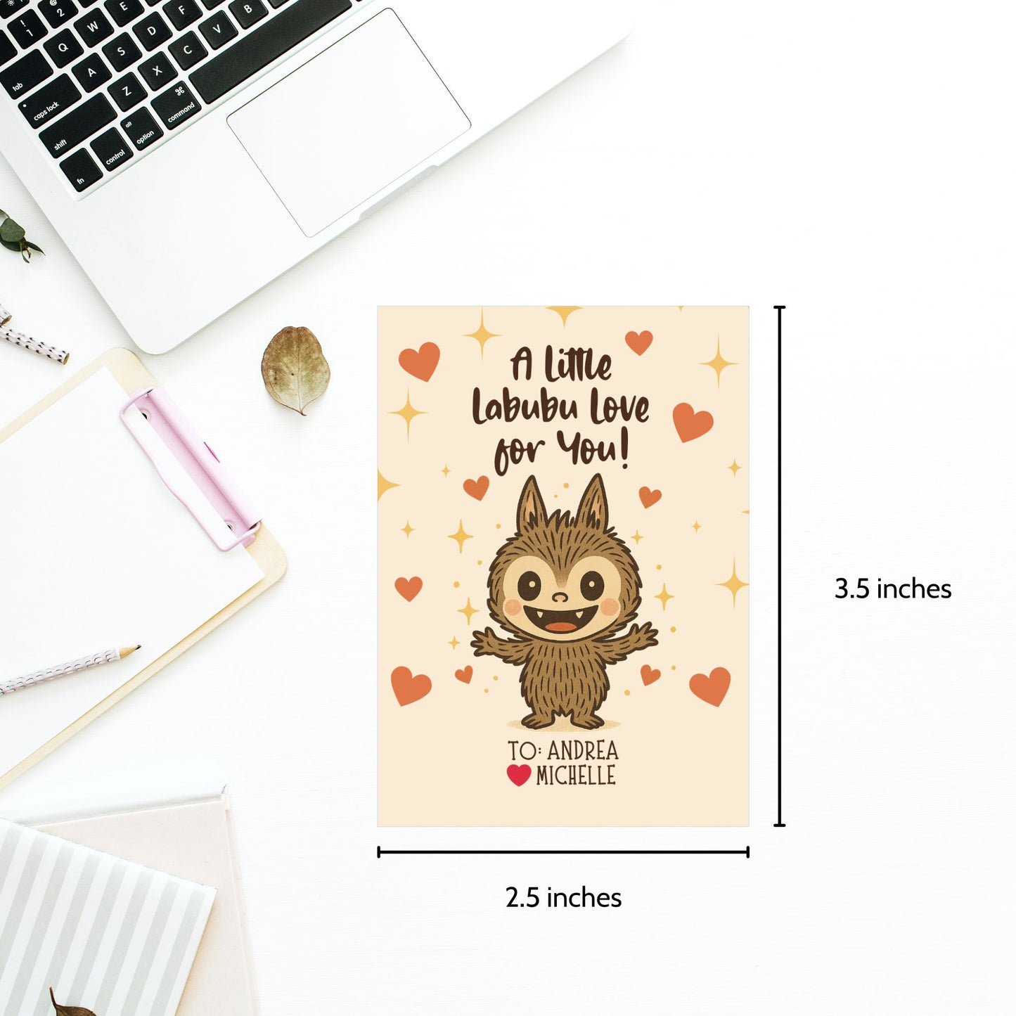 Card with a cartoon character and text on a desk with measurements shown