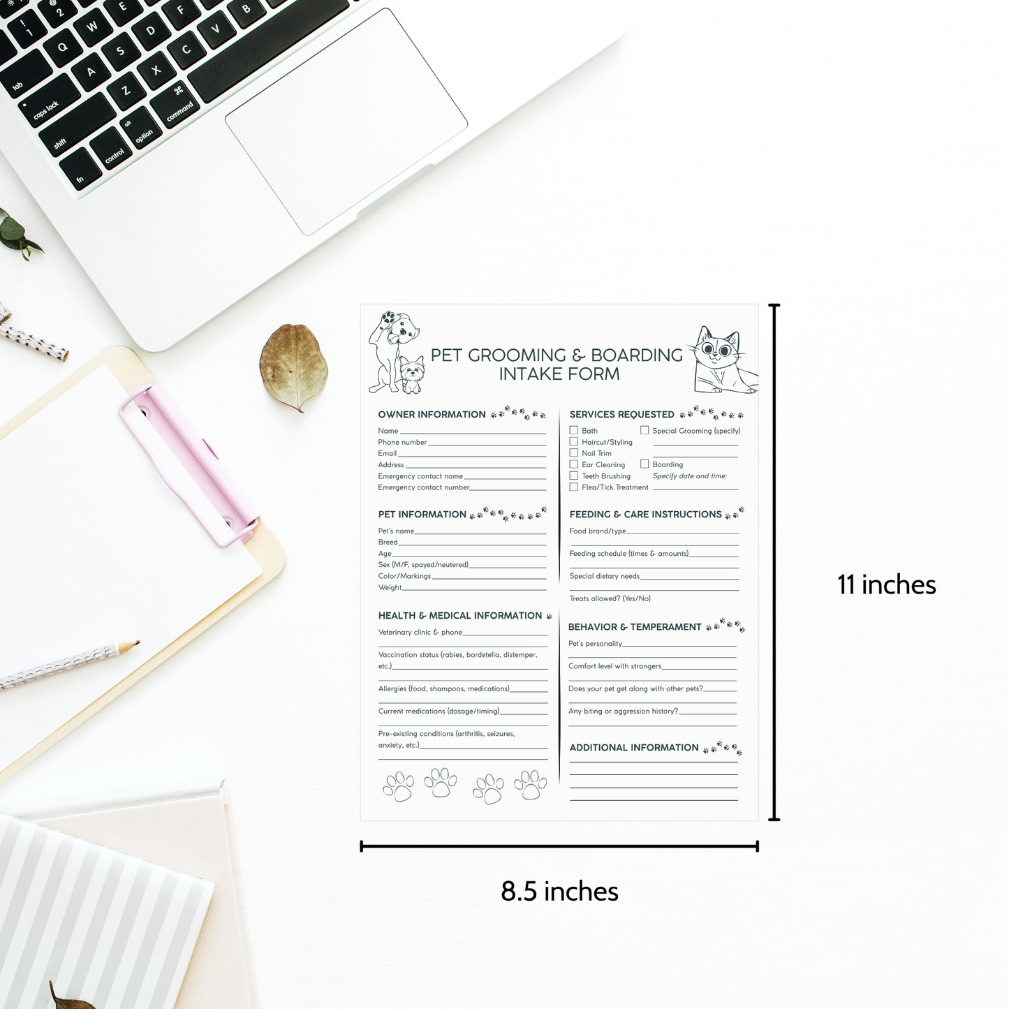Pet grooming and boarding intake form on a desk with a laptop and stationery items.