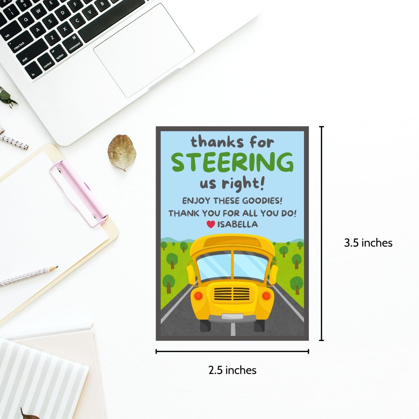 Printable bus driver appreciation tags featuring a school bus, trees, road, and the words Thanks for steering us right. Space for a personal note included.