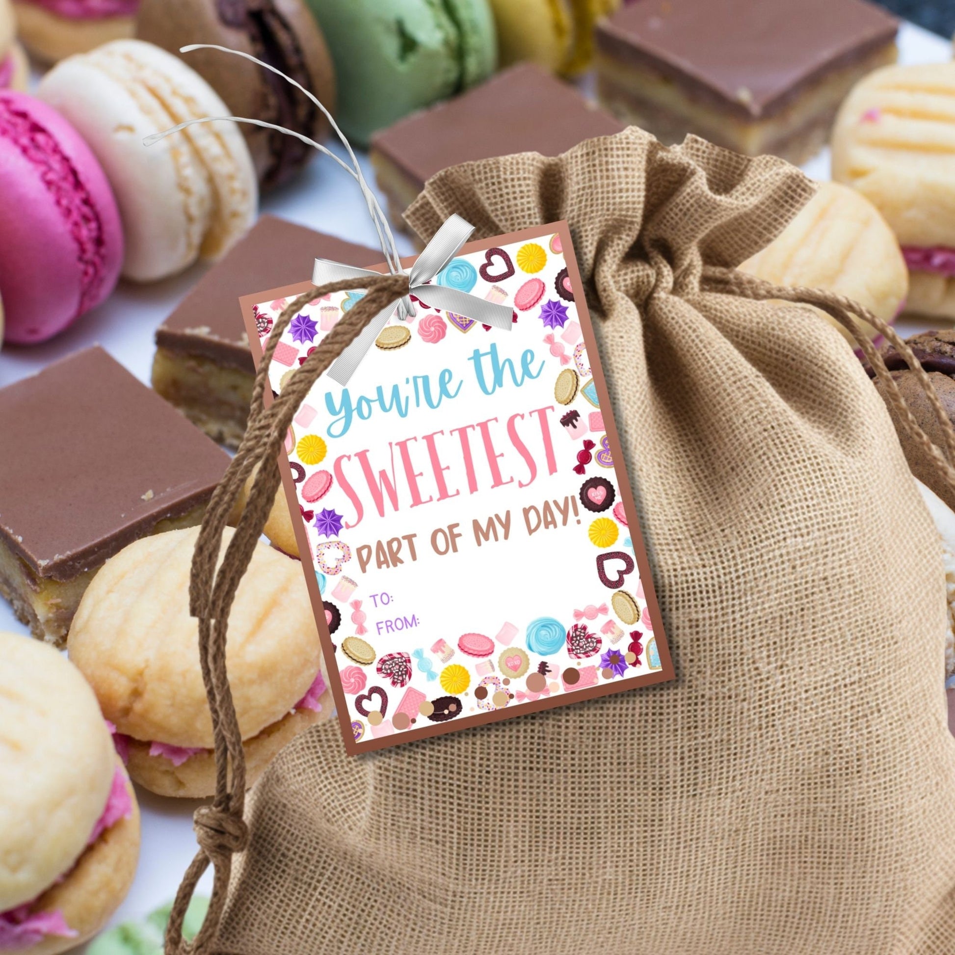 Eight colorful printable gift tags with candy and sweet treat motifs, and text "You're the SWEETEST part of my day! Thank you for all you do!" with editable name field.