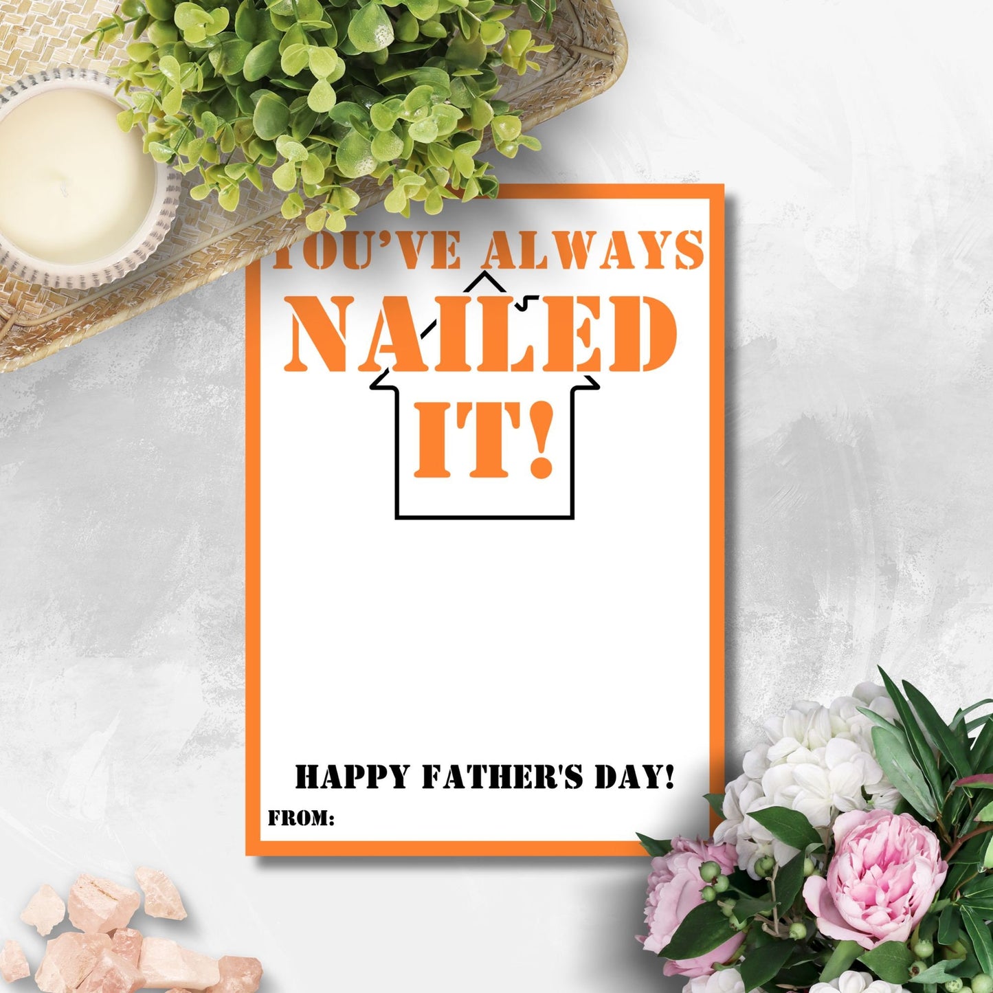 Orange and white Fathers Day card with Youve Always NAILED IT! message, featuring a playful pun with hammer and nail graphics. Space for a personalized message below.