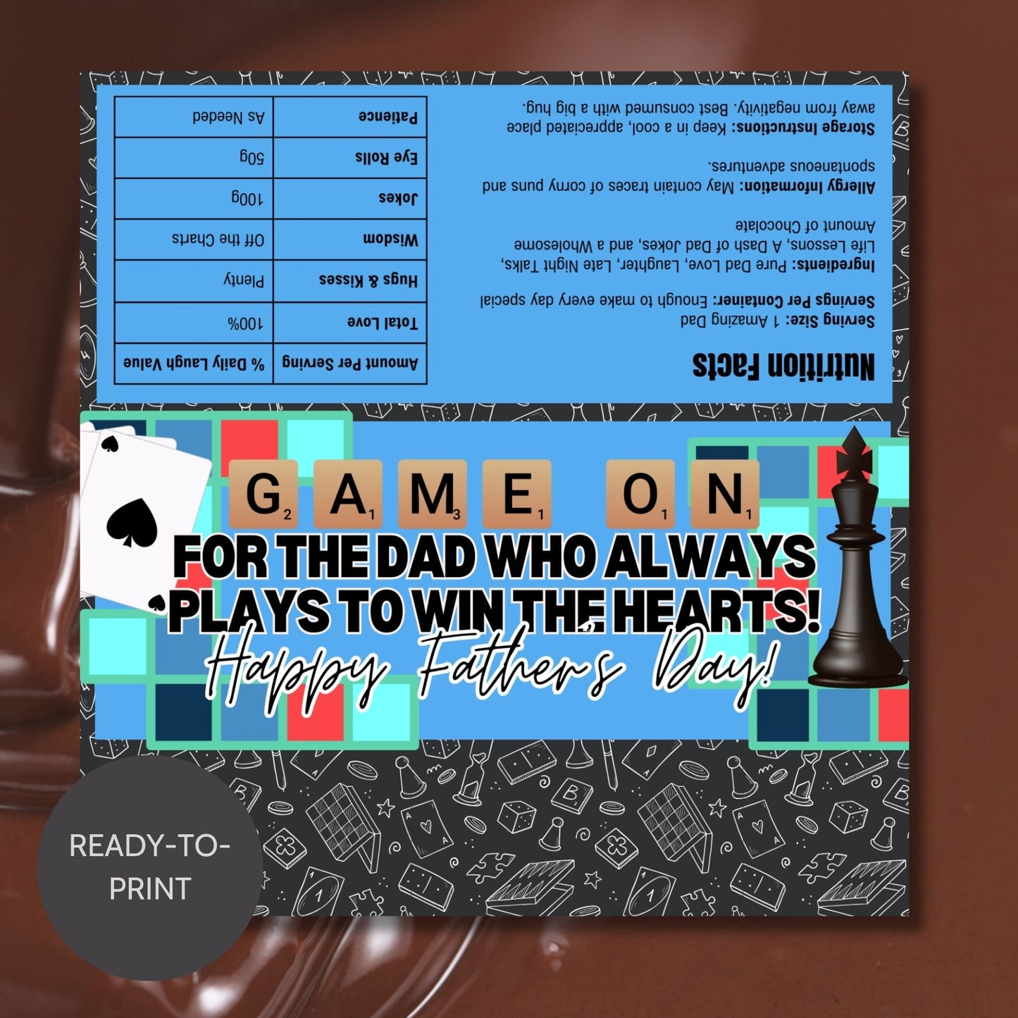 Board game-themed Fathers Day chocolate bar wrapper featuring chess and card game elements with colorful tiles and the text Game On - For the Dad Who Always Plays to Win the Hearts! Happy Fathers Day! from the Loving Family Co.