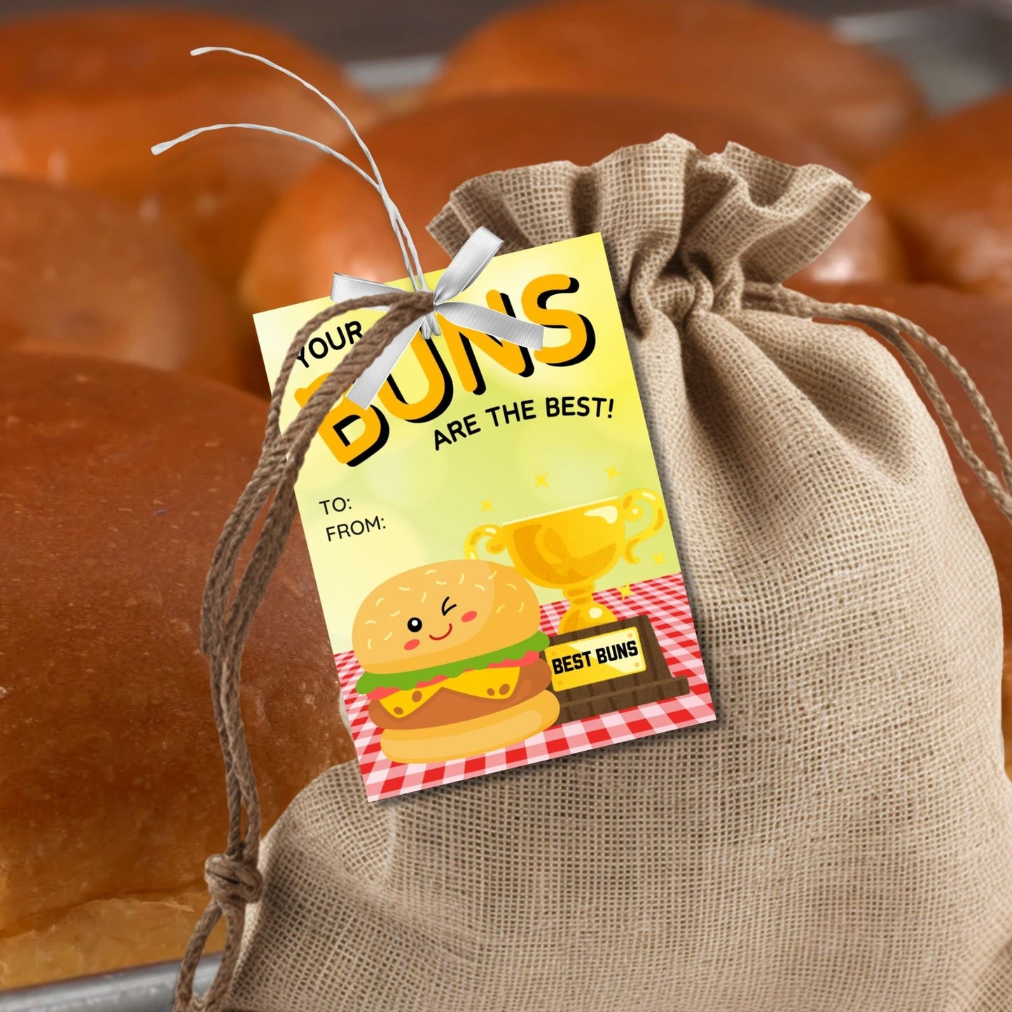 Eight buns-themed Fathers Day gift tags displayed in two rows of four. Each tag features a message about dad having the best buns, with a customizable name slot.