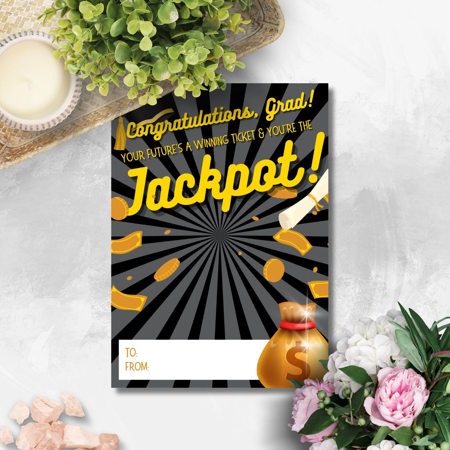 Printable 5x7 inch lotto or scratchers card holder for graduates, with a design featuring a graduation cap, gold coins, a diploma, and a money bag. Perfect for adding a fun and memorable touch to graduation gifts.