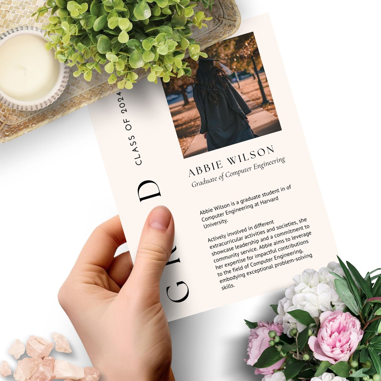 Elegant double-sided graduation party invitation featuring Abbie Wilson in graduation attire on the front and event details on the back, set against a backdrop of golden accents and classically styled text.